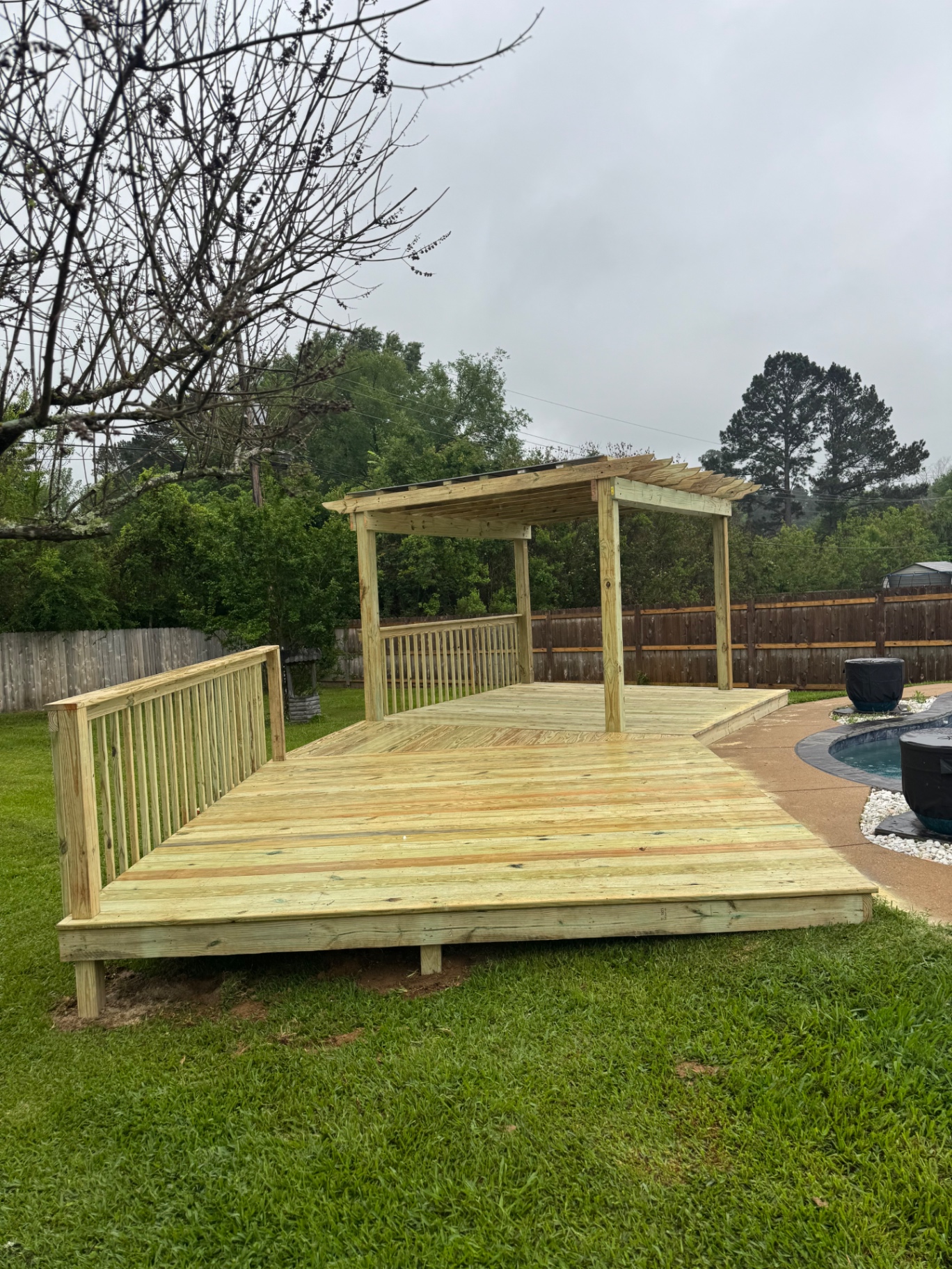 Poolside deck with pergola
